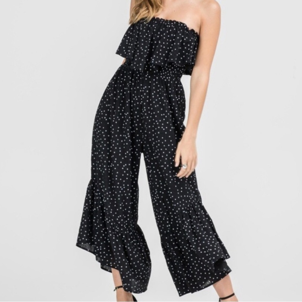 LUSH. Strapless star print ruffle jumpsuit. Size large. Black. NWOT, never worn.